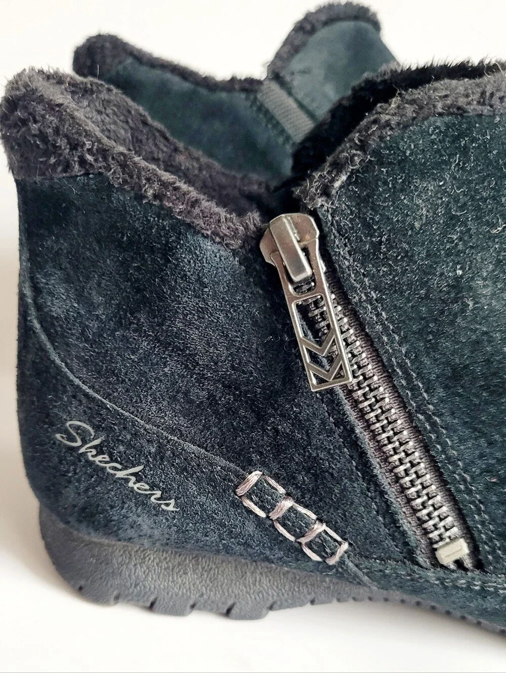 Skechers black suede